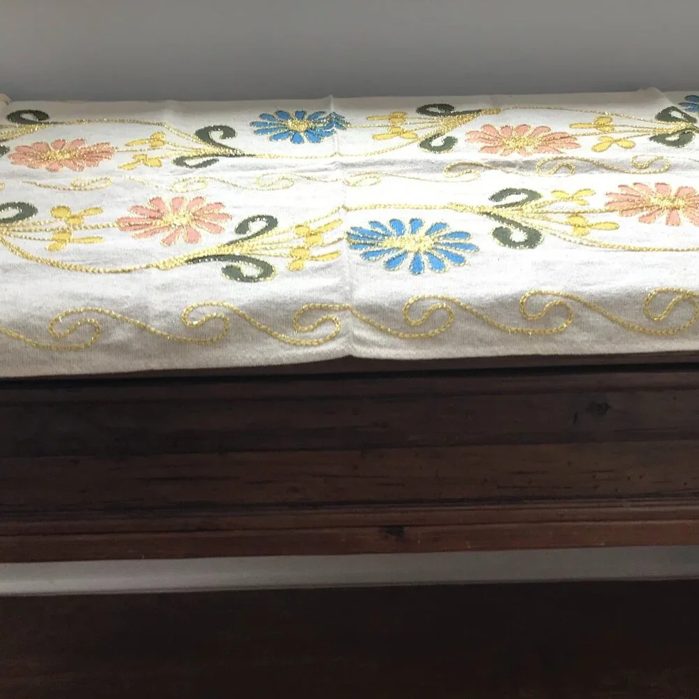 Decorative Turkish table runner with vibrant floral design.